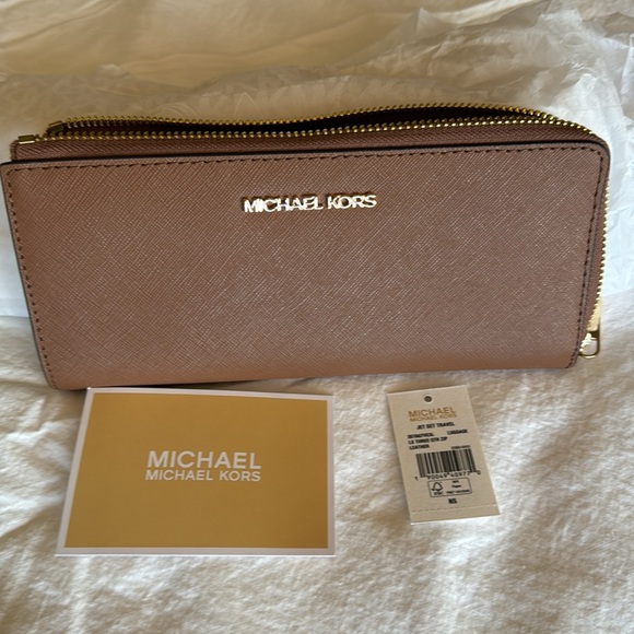 Jet Set Travel Large Saffiano
Leather Quarter-Zip Wallet - Picture 2 of 6